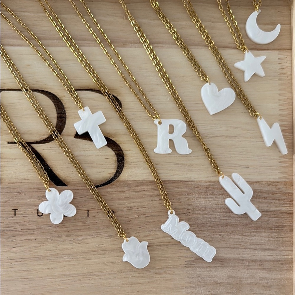 Gold Necklace with White Crescent Pendant